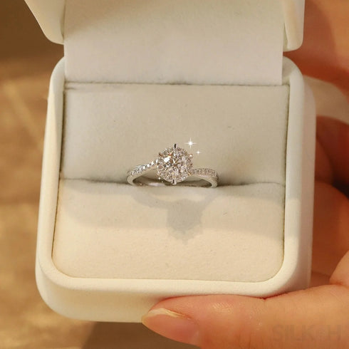 Brilliant Round Cut Moissanite Sterling Silver Twist Ring