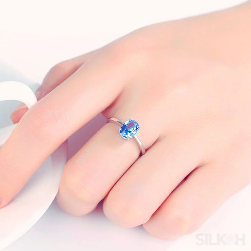 Oval Blue Topaz Sterling Silver Engagement Ring Una