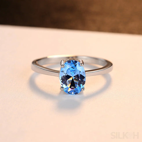 Oval Blue Topaz Sterling Silver Engagement Ring Una
