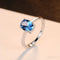 Oval Blue Topaz Sterling Silver Engagement Ring Una