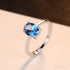 Oval Blue Topaz Sterling Silver Engagement Ring Una